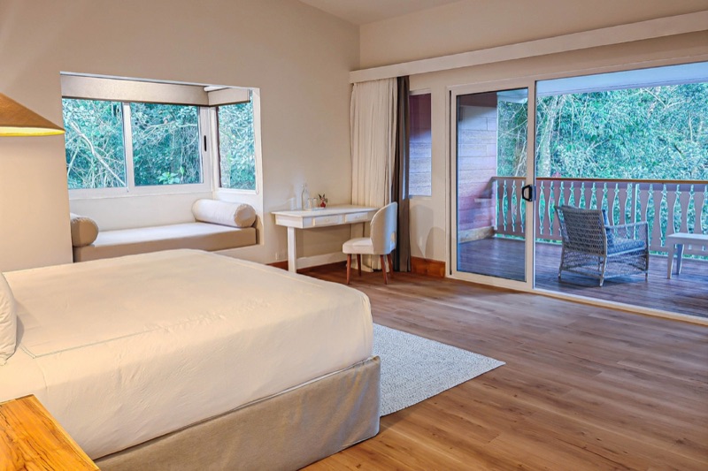 A junior suite at Cloud Forest Lodge with a terrace facing the forest